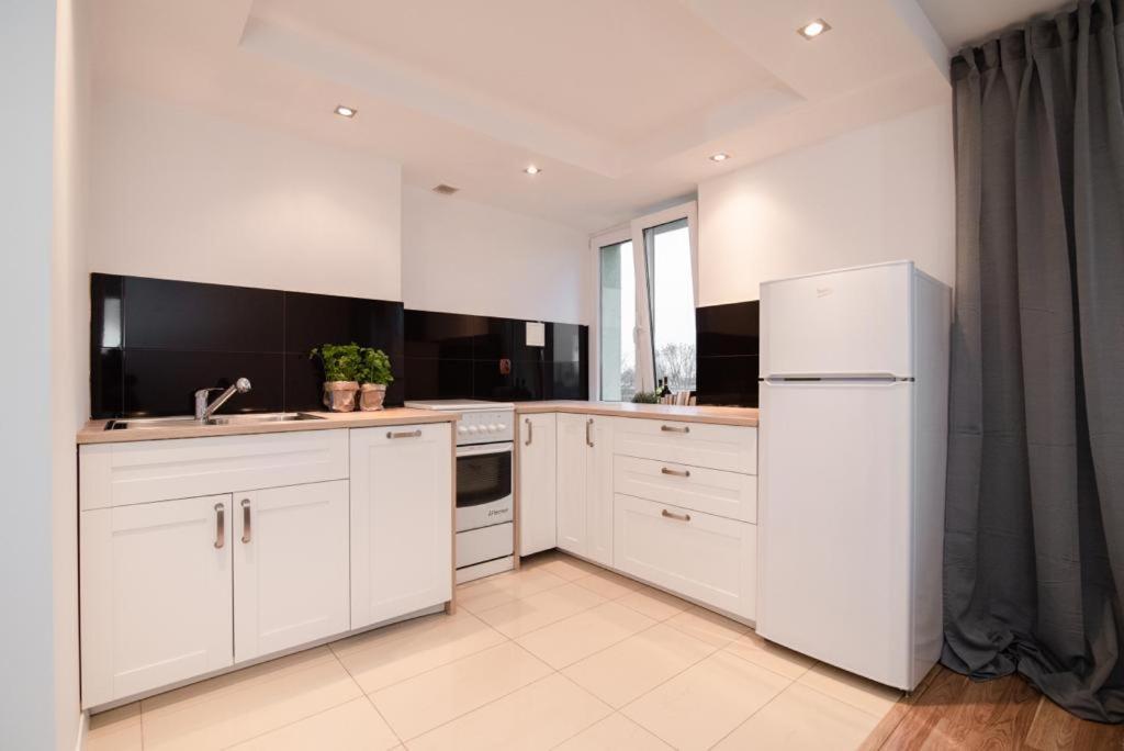 Okrzei Apartment *